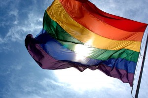 800px-Rainbow_flag_and_blue_skies